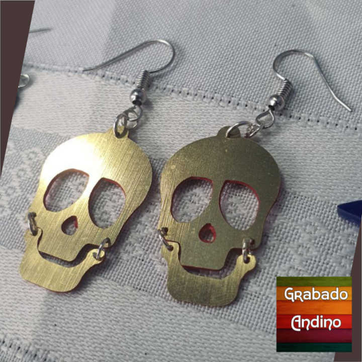 aretes calaveras sonrientes